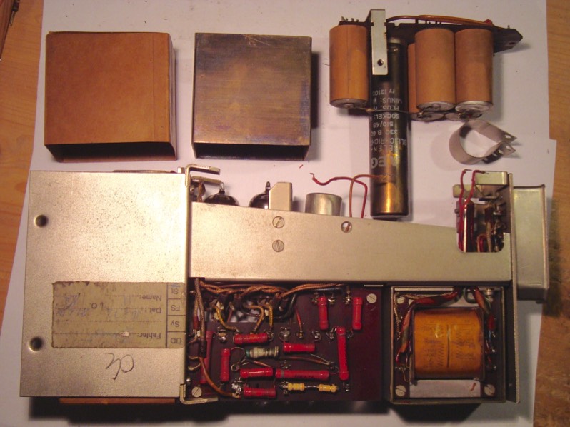 Dissection of PSU. Top left: Cardboard & Mumetal screen of mains transformer
